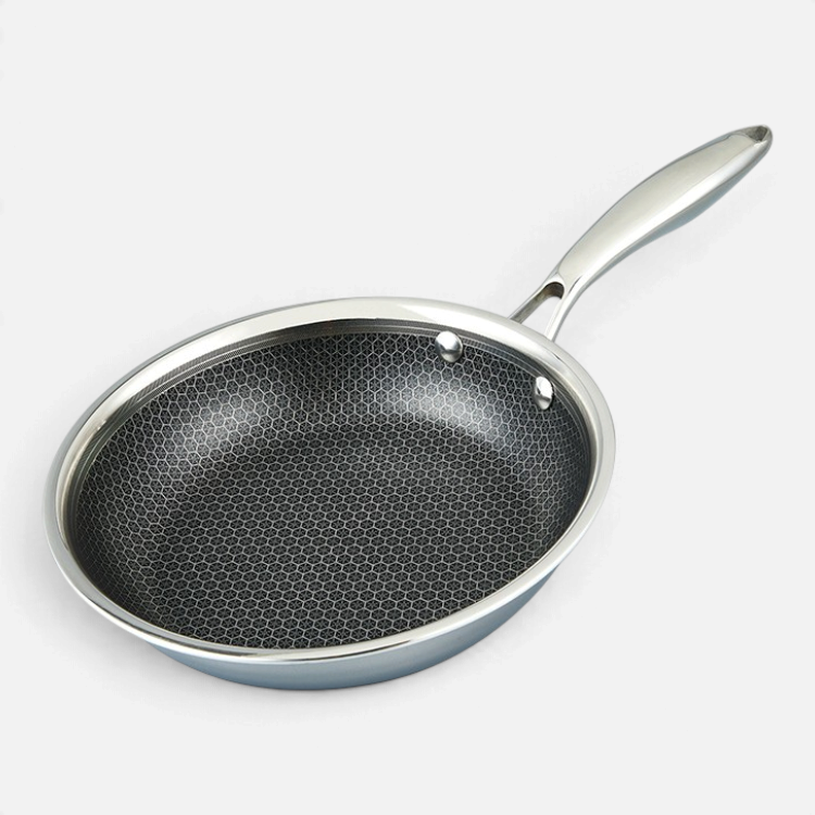 Ostrera 28 cm stainless steel hybrid frying pan with a durable honeycomb non-stick surface and ergonomic handle